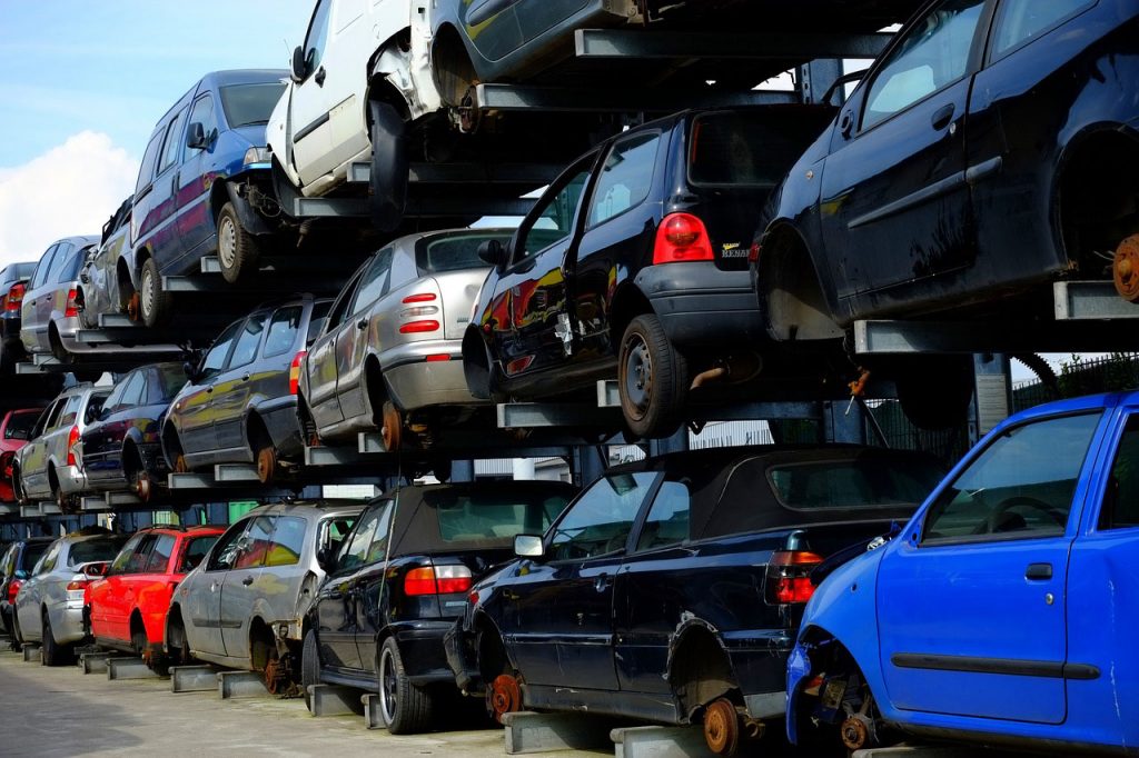 Piles Of Cars At The Wrecker Service Yard